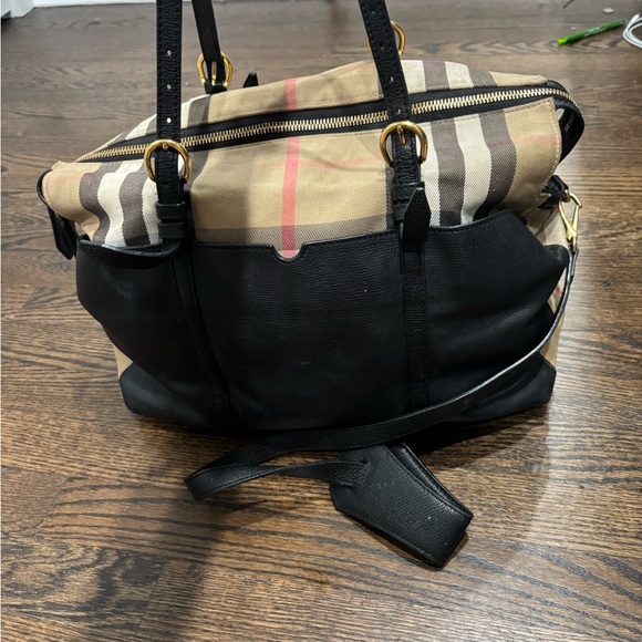 Burberry Black and Tan Messenger Bag with Structured Design